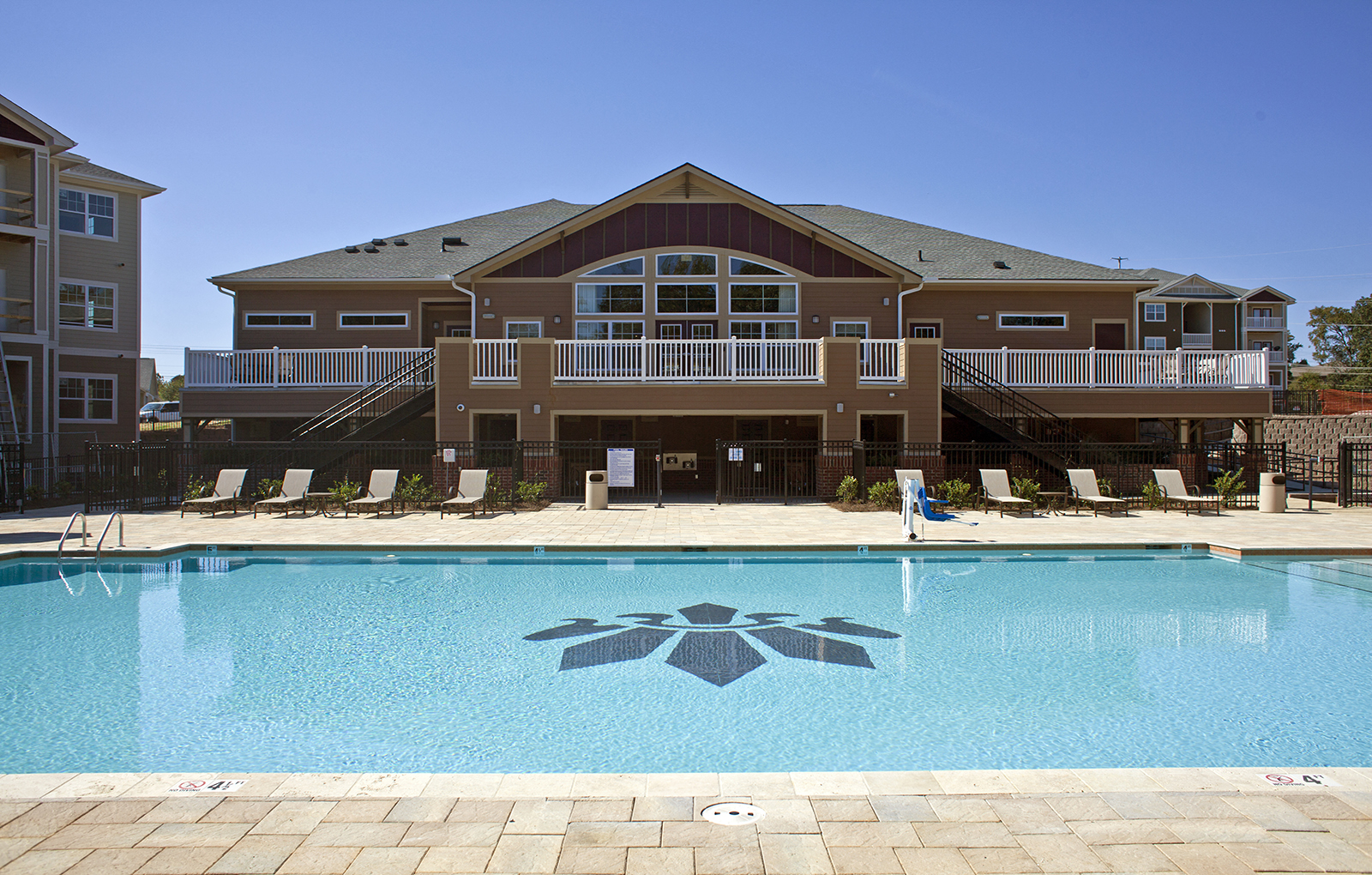 Swimming Pool with Lounge Chairs at Phillips Mallard Creek Apartments, 28262
